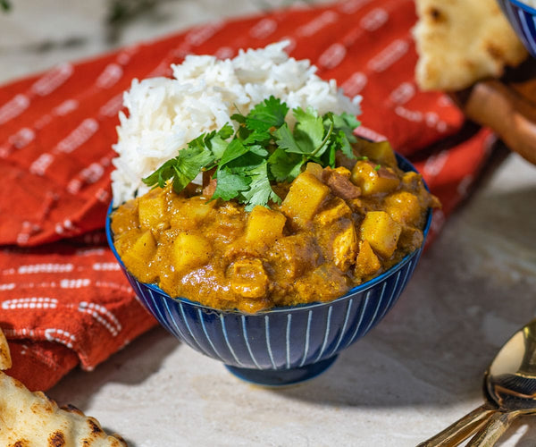 https://www.savoryspiceshop.com/cdn/shop/files/chicken-vindaloo2_web-crop_grande.jpg?v=1686949411