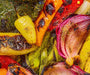 A macro up close image of mt. Elbert all-purpose seasoning on grilled vegetables. 